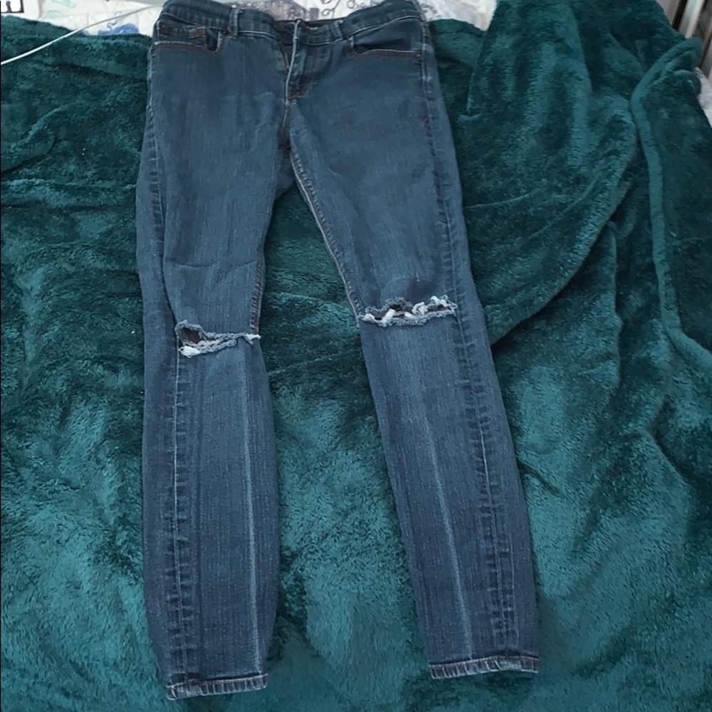 blue ripped jeans